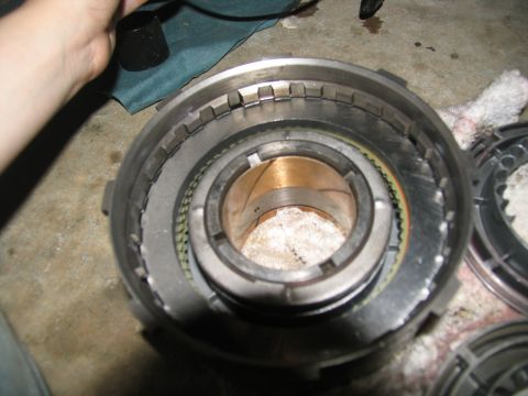 1978 Ford Bronco - A disassembled transmission component, likely a clutch pack, is shown with its internal parts visible.