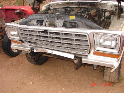 1978 Ford Bronco - Front view of a 1978 Ford Bronco with its hood open, showing the engine compartment.