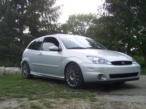 2003 Ford Focus - Silver 2003 Ford Focus hatchback with aftermarket wheels.
