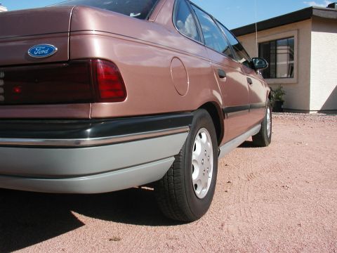 1990 Ford Taurus - I had to paint the bumpers myself. Not bad for Krylon and a teenager.