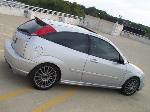 2003 Ford Focus - Silver 2003 Ford Focus hatchback parked on a rooftop level.