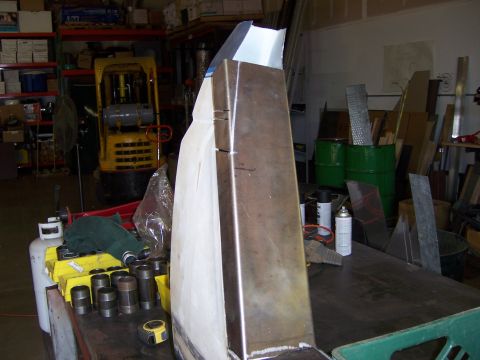 1991 Ford Bronco - A metal fabrication project is underway in a workshop, with various tools and materials visible.
