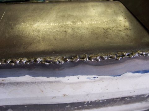 1991 Ford Bronco - Rough metal seam shows evidence of recent welding work.