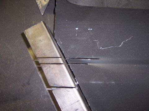 1991 Ford Bronco - Metal fabrication work in progress on a vehicle panel, possibly for a custom project.