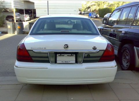 2007 Mercury Grand Marquis - Rear view of a white 2007 Mercury Grand Marquis parked in Kuwait.
