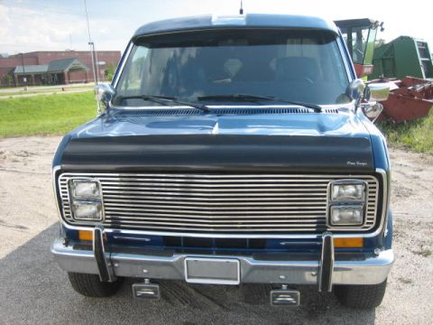 1978 Ford E250 - Front view of a blue 1978 Ford E250 van, a prominent chrome grille.