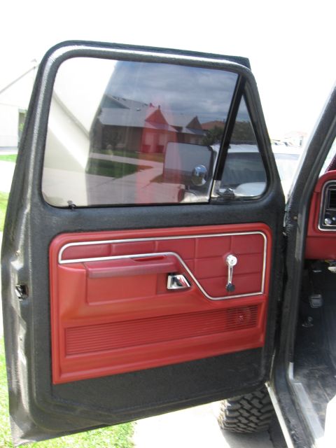 1979 Ford Bronco - Interior view of a 1979 Ford Bronco's driver side door panel.