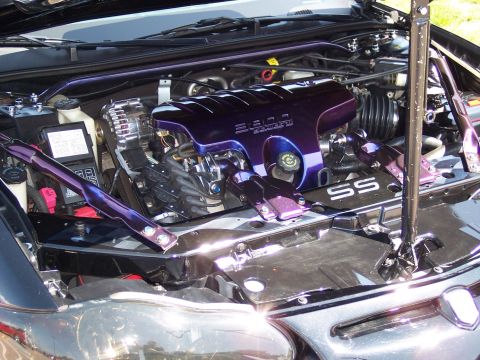 1972 Ford Ranchero - The engine bay features a custom painted engine cover and chrome accents.