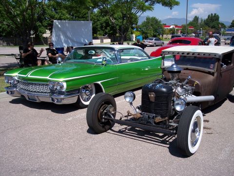 1972 Ford Ranchero - Two custom vehicles are parked side-by-side at an outdoor event.