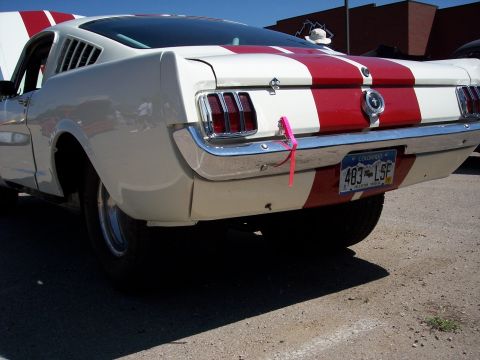 1972 Ford Ranchero - Rear view of a white coupe with red racing stripes and a Colorado license plate.