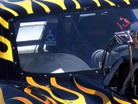 1972 Ford Ranchero - Custom hot rod interior with racing seat and roll cage, flame paint and a handicap placard.