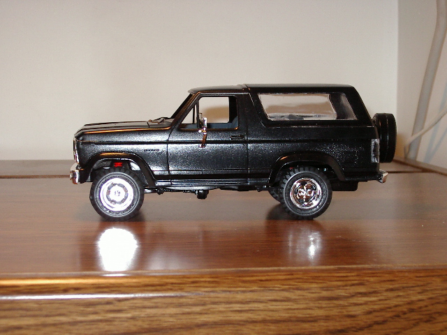 Black 1986 Ford Bronco model, side view