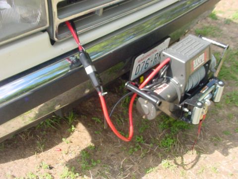 1988 Ford Bronco front bumper with a WARN winch and Washington license plate 076-RK