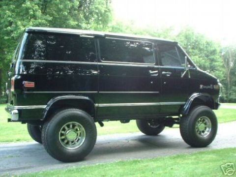 1978 Ford E250 - This van has been modified with a suspension lift and large off-road tires.