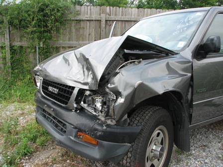 1991 Ford Bronco - This Isuzu Rodeo sustained significant damage to its front end and driver's side fender.