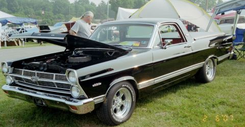 1976 Ford Ranchero - Black 1966 Ford Fairlane 500 coupe utility with chrome wheels and hood up.