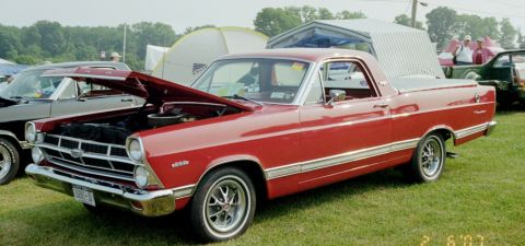 1976 Ford Ranchero - A red 1968 Ford Ranchero is displayed with its hood up at an outdoor event.