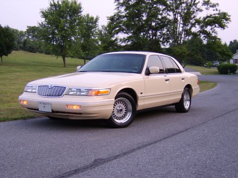 1996 Mercury Grand Marquis - This 1996 Mercury Grand Marquis sedan is captured from a three-quarter front view, its classic design.