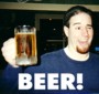 1991 Ford LTD Crown Victoria - A small, heavily compressed avatar-sized image of a person in a dark blue shirt holding up a full glass mug of beer, with the word "BEER!"…
