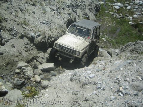 1987 Suzuki Samurai - A Suzuki Samurai tackles a challenging off-road course in a rocky canyon.