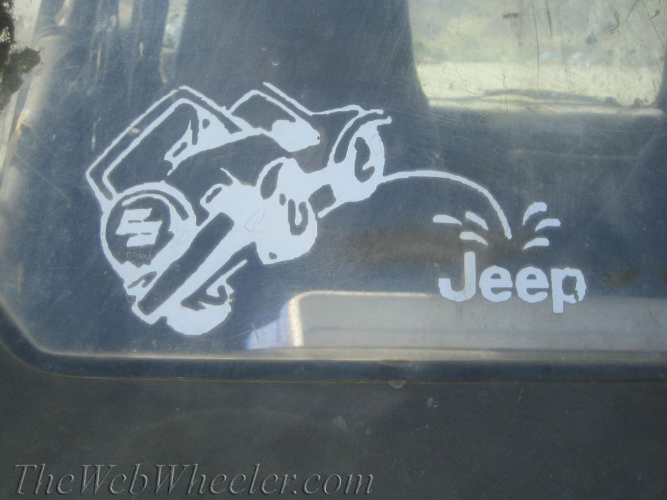 Suzuki Samurai sticker peeing on Jeep logo