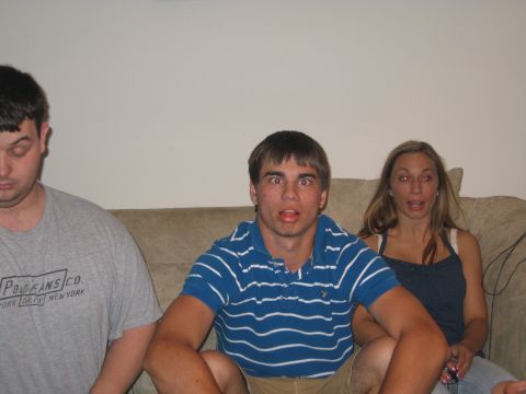1988 Ford Bronco - Three people are sitting on a couch, with two of them making silly faces.