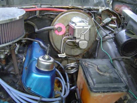 1979 Ford Bronco - Close-up view of the engine bay, showing various components and wiring.