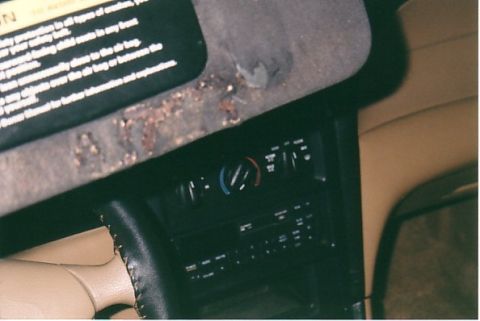 1991 Ford LTD Crown Victoria - Top of drivers' visor torn from garage door opener