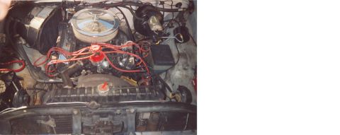1979 Ford Bronco - Engine bay details, including air cleaner and wiring, are visible in this photo.