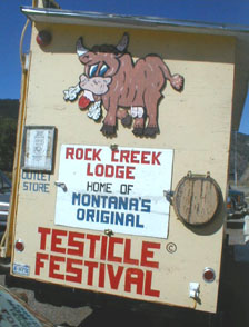 1974 Ford Ranchero - A building displays signage for the Rock Creek Lodge and its annual Testicle Festival.