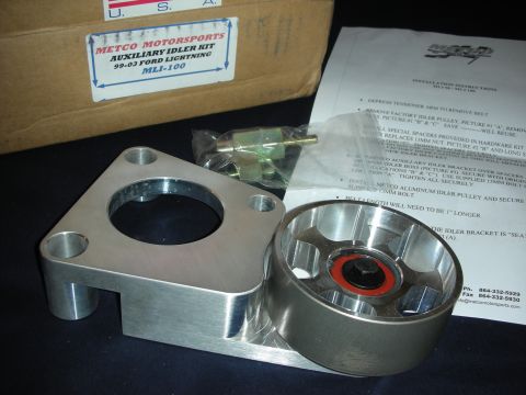 1998 Ford Crown Victoria - An auxiliary idler kit for a 1999-2003 Ford Lightning is laid out with its instructions and hardware.