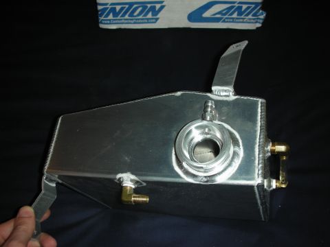 1998 Ford Crown Victoria - A custom aluminum coolant overflow tank is shown against a black background, with a Canton Racing Products box in the upper portion of the…
