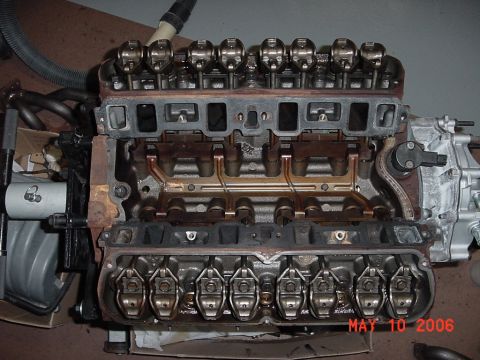 1994 Ford Bronco - Close-up view of an engine's internal components, including rocker arms and intake ports. The date "MAY 10 2006" is visible.