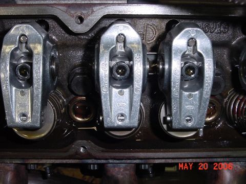 1994 Ford Bronco - Engine valve train components, including rocker arms with visible part numbers, are shown in this close-up.
