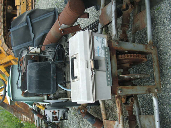 engine, fuel tank, exhaust pipe, and chain drive system