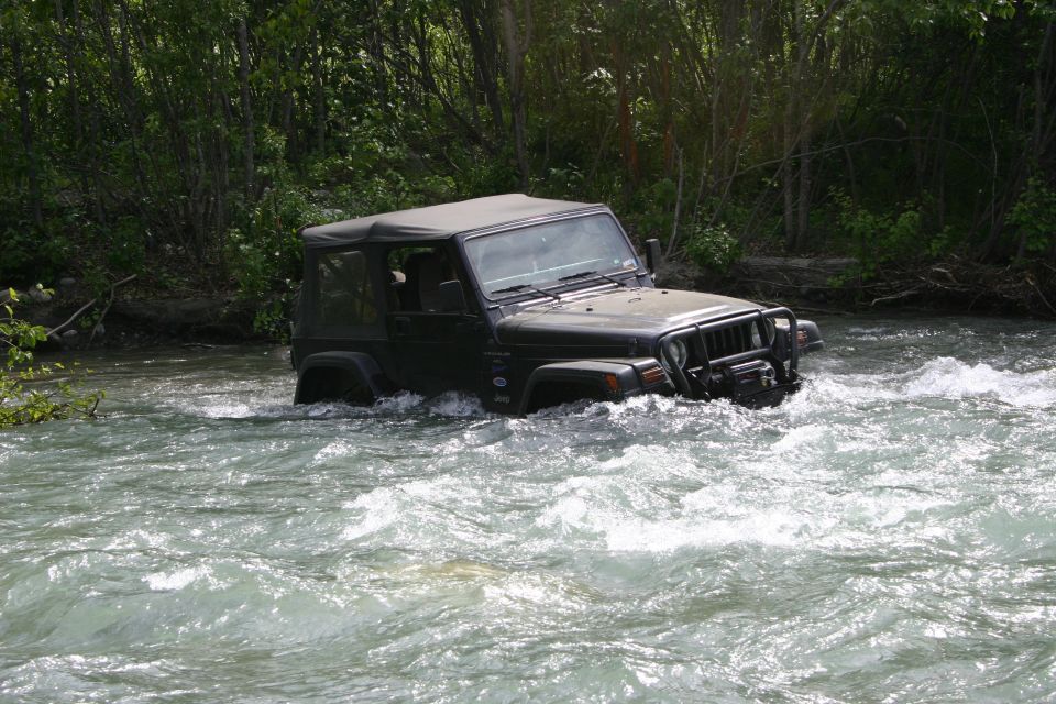 2003 Jeep TJ driving through river