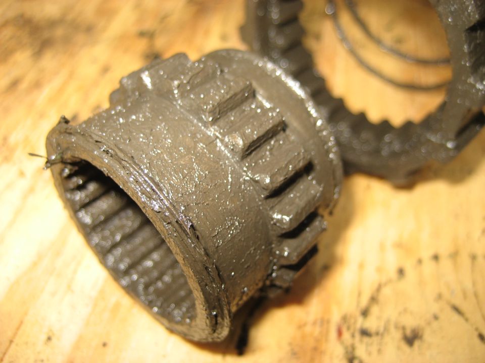 Grease-packed splined locking hub clutch ring on plywood