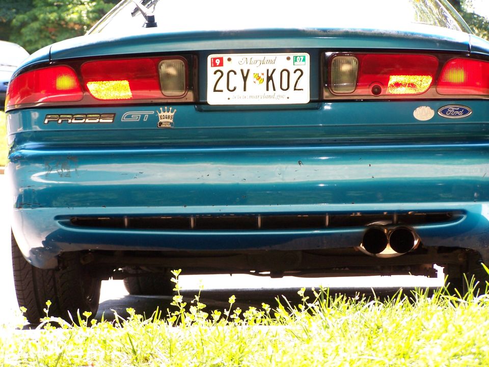 Rear of a teal 1994 Ford Probe GT with Maryland plates