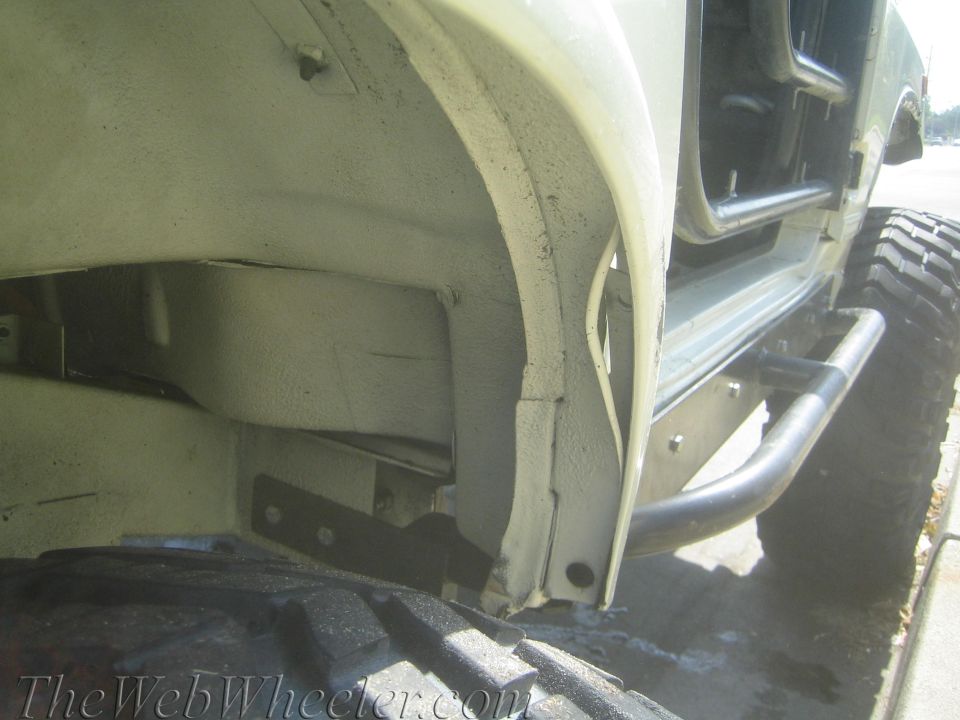 Off-road vehicle frame, roll cage, and large tire