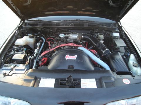 1992 Ford Crown Victoria - Engine bay of a 1992 Ford Crown Victoria, a Summit Racing fan shroud.
