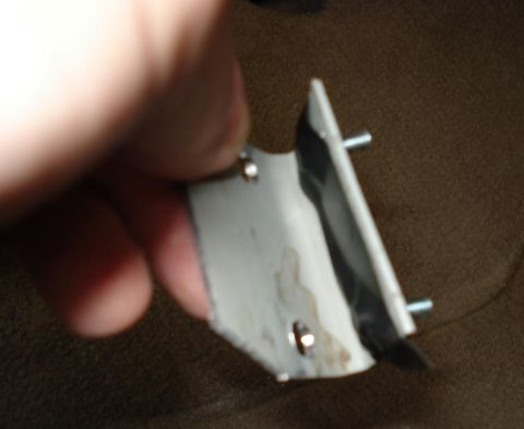 1999 Ford Crown Victoria - Before mounting the bracket I used tape to hold screws in place while I put the nuts of