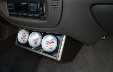 1999 Ford Crown Victoria - Oringinal cigarette lighter & ashtray was removed and replaced with these gauges, Thats why i added this new outlet