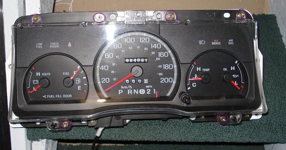 Instrument Cluster Lens Held in place by 6 screws (T-15 Torx)