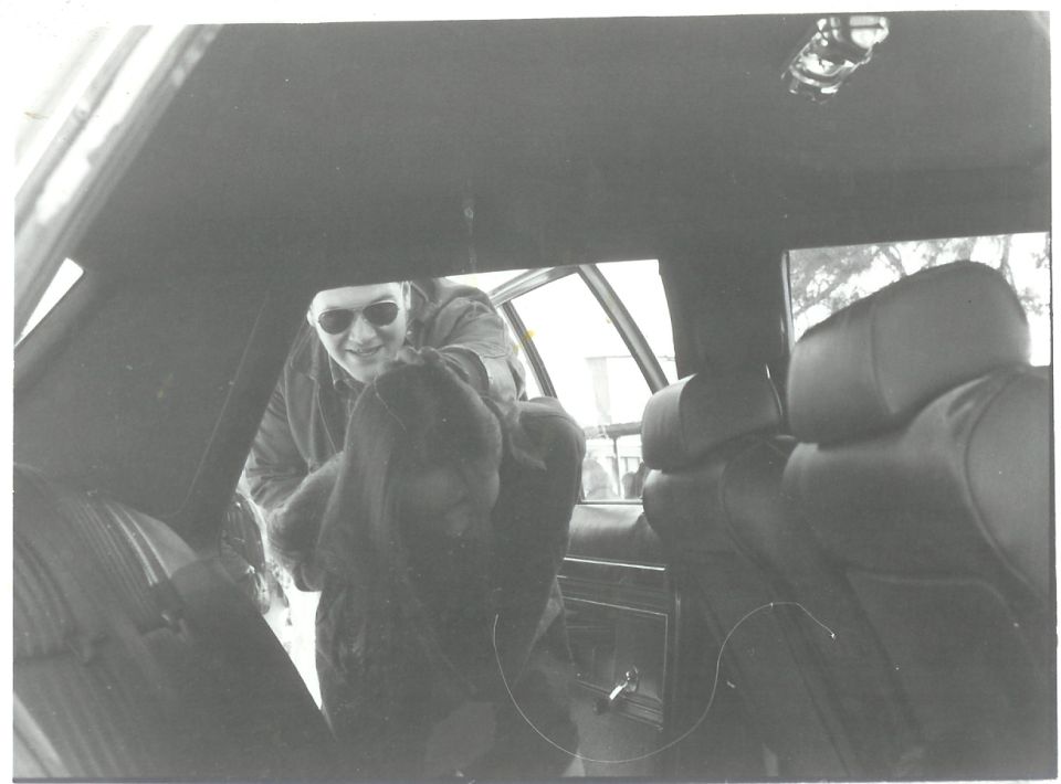 1987 Ford Crown Victoria LTD interior, person in sunglasses looking into car
