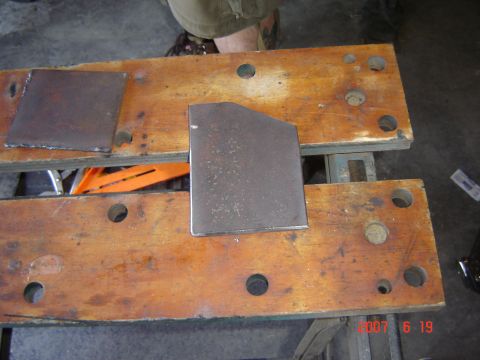 1993 Ford Bronco - Metal plates are shown on a workbench, with a date stamp visible in the lower right corner.