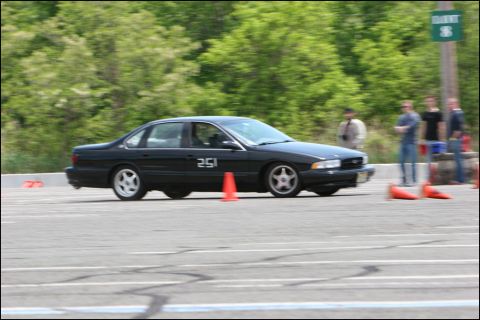 2001 Mercury Grand Marquis - A black sedan navigates an autocross course, marked with the number 251.