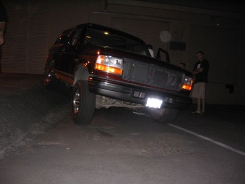1996 Ford Bronco - Front view of a 1996 Ford Bronco parked at night.