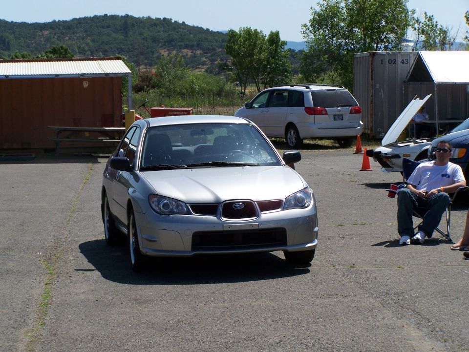 Silver Subaru Impreza WRX front view
