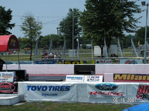 1988 Ford Mustang - A drag strip scene with various sponsor banners and a date stamp of June 16, 2007.