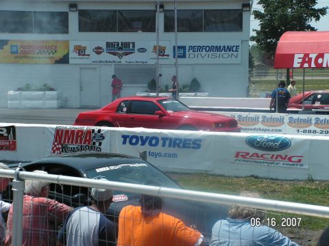 1988 Ford Mustang - Red 1988 Ford Mustang competes in a drag race at an NMRA event.